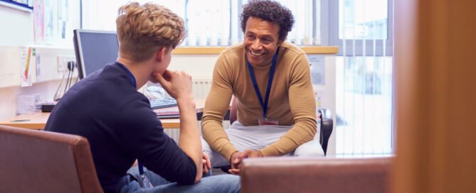 Student talking to teacher about behaviour