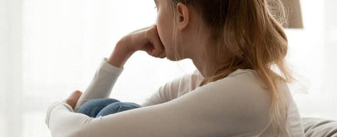 Girl looking out of the window